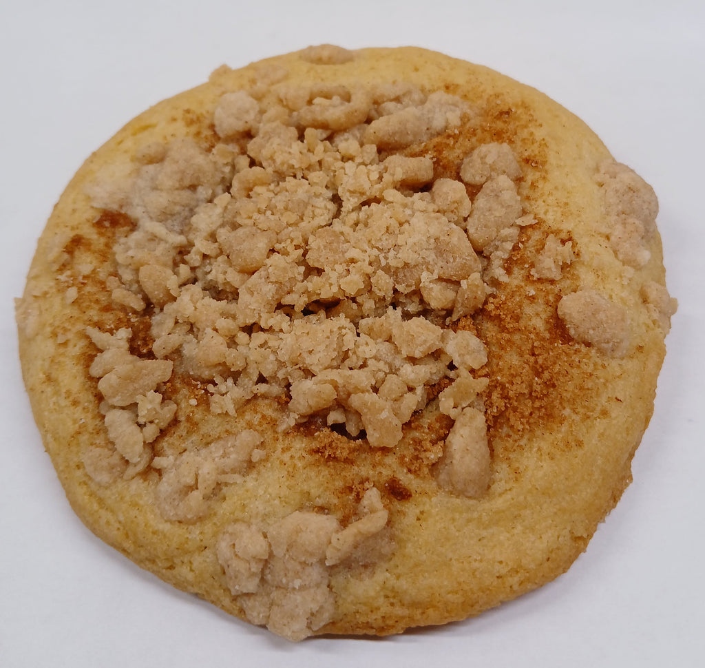 GF Cookie with crumbly topping on a white surface