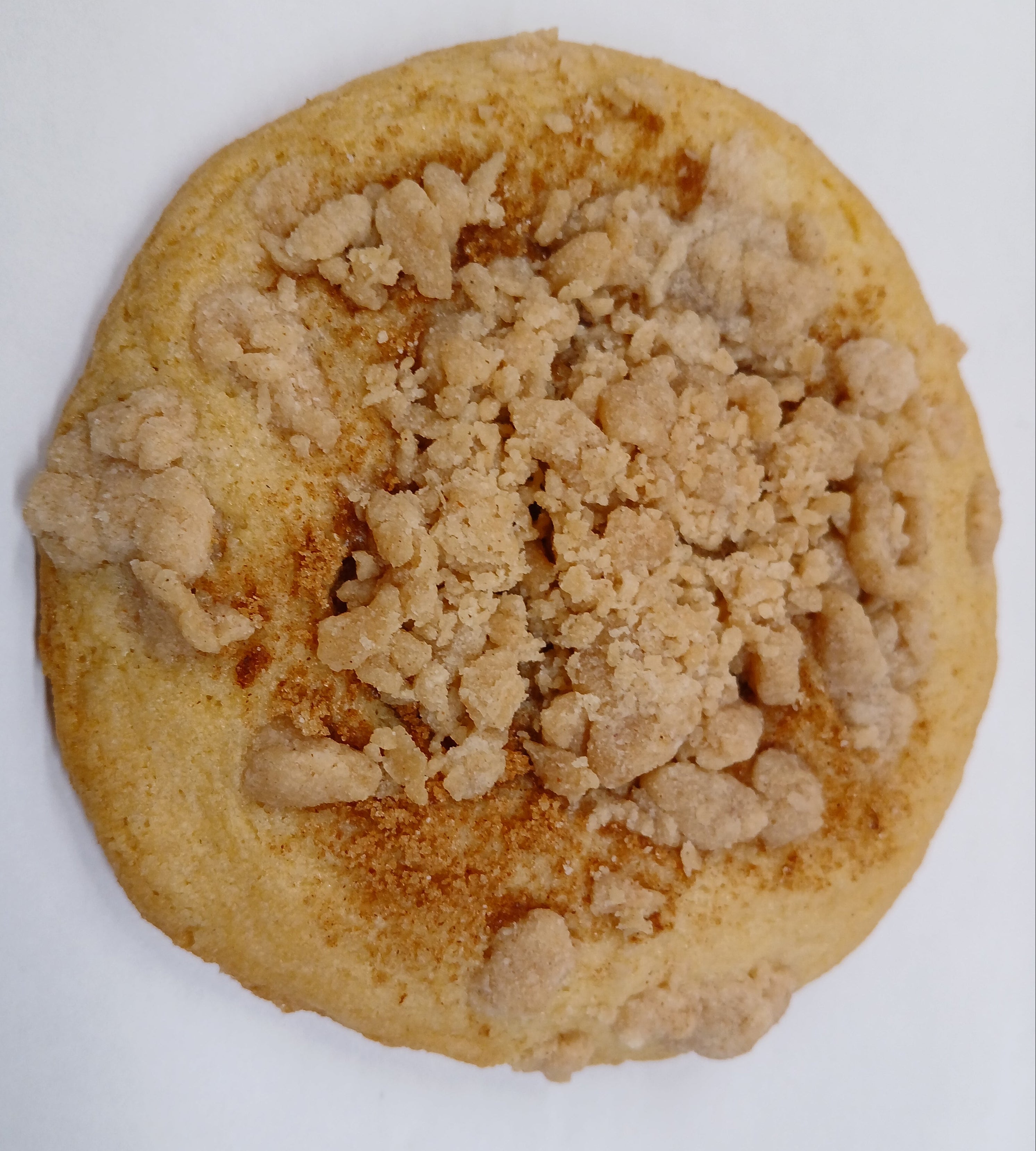 GF Cookie with crumbly topping on a white background