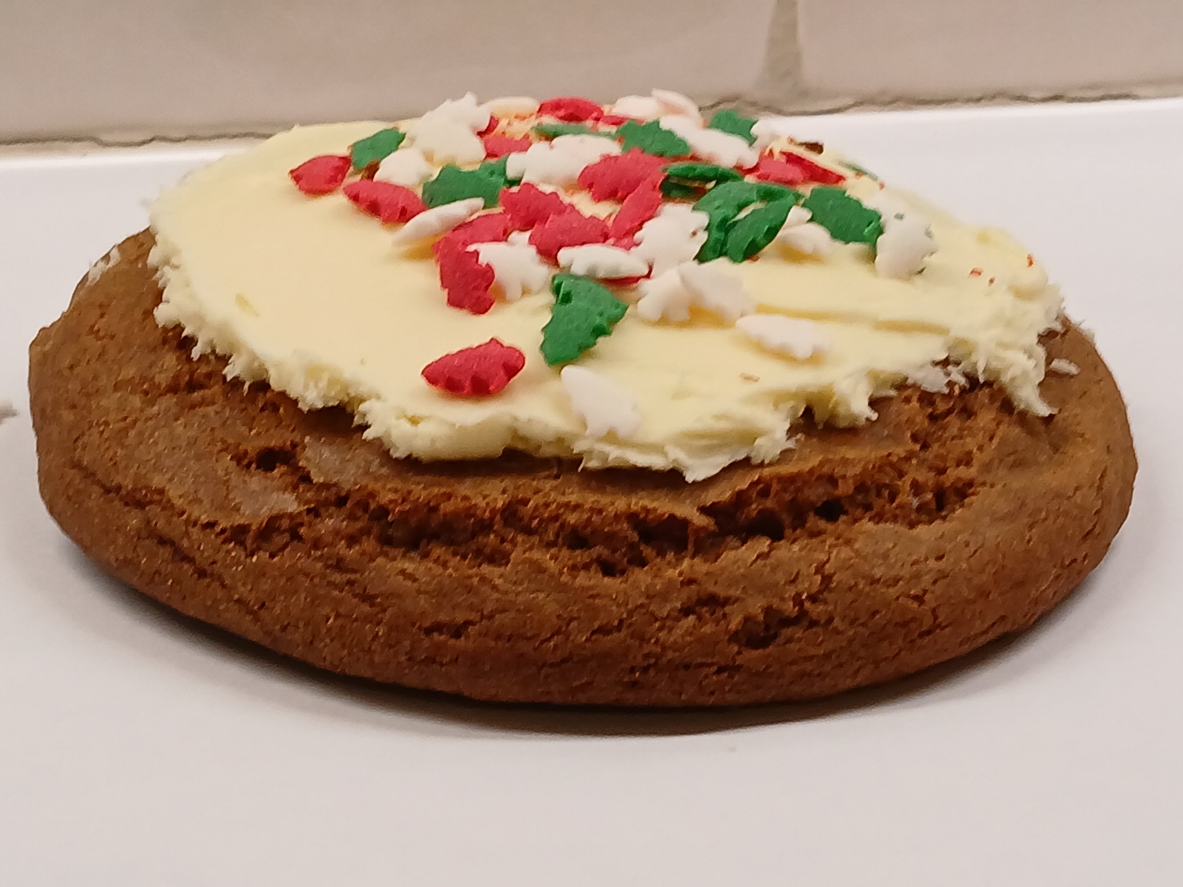 Gluten-free gingerbread cookie with festive frosting
