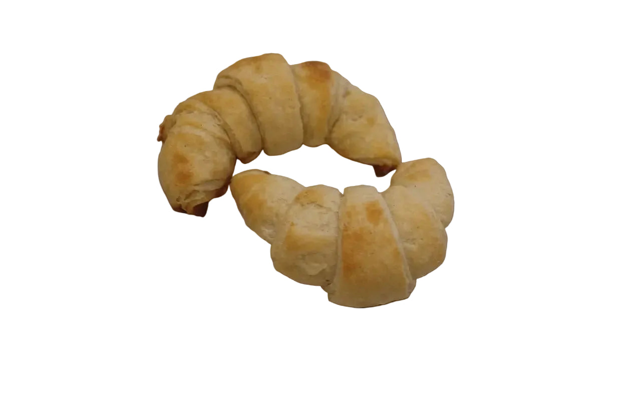 GF Croissants on a white plate on a marble countertop